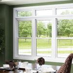 Three pane window looking out from dining room to trees